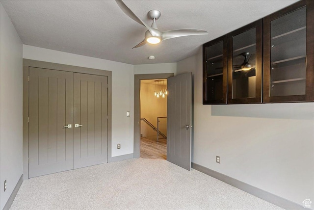 59 W 600 N, Farmington, UT 84025 - unfurnished bedroom with carpet floors, baseboards, a closet, and ceiling fan