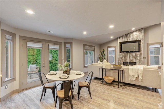 59 W 600 N, Farmington, UT 84025 - dining space with light wood finished floors, a large fireplace, french doors, recessed lighting, and baseboards