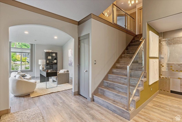 59 W 600 N, Farmington, UT 84025 - stairway featuring arched walkways, wood finished floors, baseboards, and recessed lighting