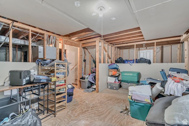 unfinished basement featuring electric panel