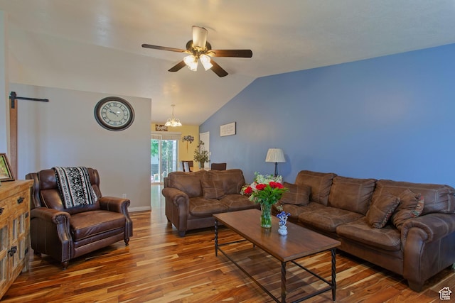 841 W 1235 S, Payson, UT 84651 - living room with wood finished floors, ceiling fan, lofted ceiling, a barn door, and baseboards