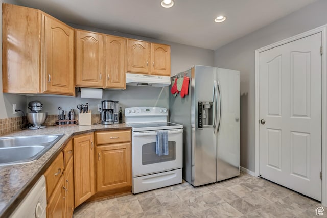 kitchen featuring white electric stove, under cabinet range hood, stainless steel refrigerator with ice dispenser, dishwasher, and recessed lighting