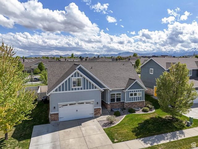 3263 W Blue Moon Ln, South Jordan, UT 84095 - craftsman house with stone siding, concrete driveway, a front yard, a residential view, and a shingled roof