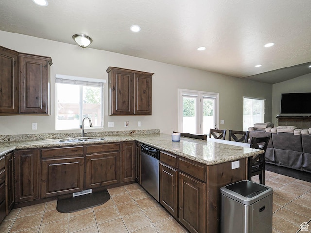 3263 W Blue Moon Ln, South Jordan, UT 84095 - kitchen with dishwasher, a sink, open floor plan, a breakfast bar area, and recessed lighting