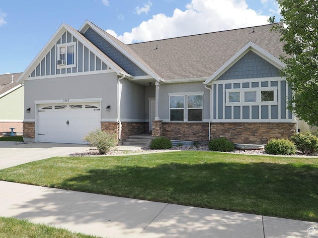 3263 W Blue Moon Ln, South Jordan, UT 84095 - craftsman house with stone siding, concrete driveway, stucco siding, a front yard, and a shingled roof