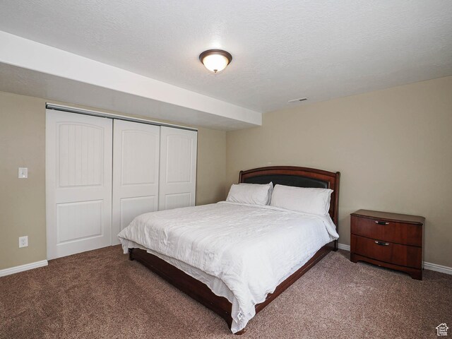 3263 W Blue Moon Ln, South Jordan, UT 84095 - bedroom with carpet floors, a closet, baseboards, and a textured ceiling