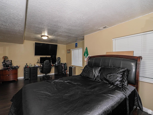 3263 W Blue Moon Ln, South Jordan, UT 84095 - bedroom with wood finished floors, a textured ceiling, baseboards, and a desk