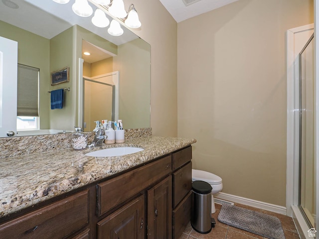 3263 W Blue Moon Ln, South Jordan, UT 84095 - full bathroom featuring a shower stall, baseboards, tile patterned flooring, vanity, and toilet