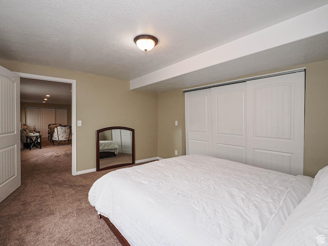 3263 W Blue Moon Ln, South Jordan, UT 84095 - carpeted bedroom with a closet, a textured ceiling, and baseboards