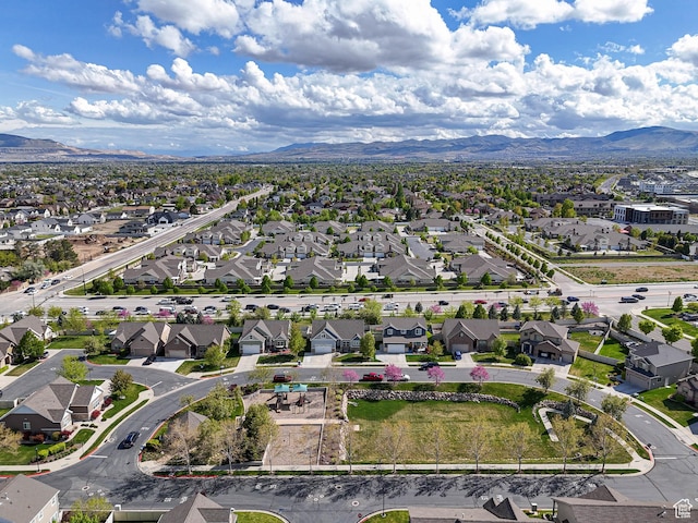 3263 W Blue Moon Ln, South Jordan, UT 84095 - aerial view of property and surrounding area with nearby suburban area and a mountain backdrop