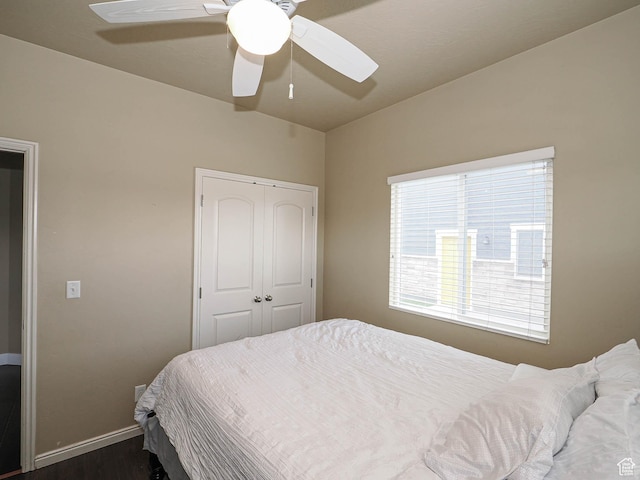 3263 W Blue Moon Ln, South Jordan, UT 84095 - bedroom featuring dark wood-style flooring, baseboards, a closet, and a ceiling fan