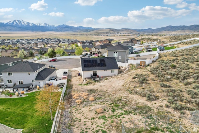 aerial view of residential area with mountains