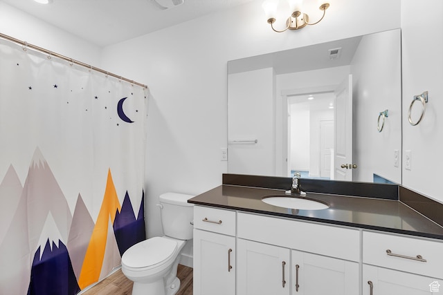 876 S Brubaker Way, Santaquin, UT 84655 - bathroom with toilet, vanity, wood finished floors, baseboards, and curtained shower