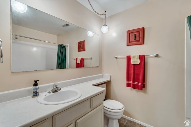1256 W Norwalk Rd S, Taylorsville, UT 84123 - full bathroom featuring toilet, vanity, tile patterned floors, a shower with shower curtain, and baseboards