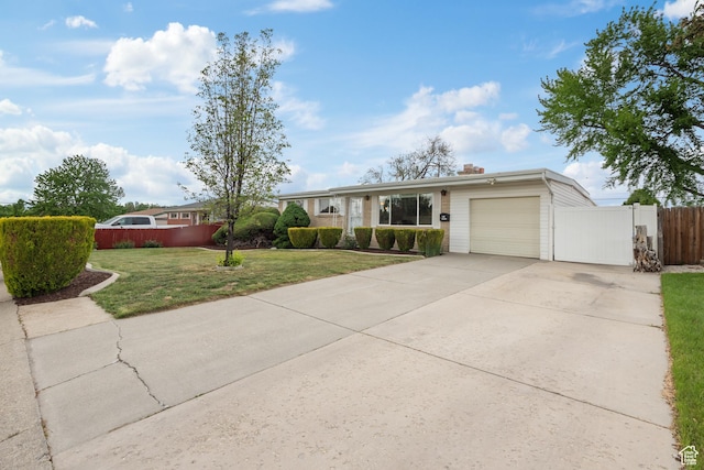 view of front of house featuring an attached garage and driveway