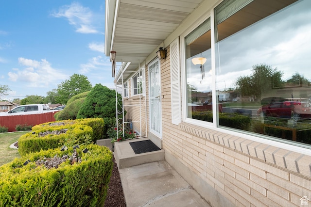 view of patio featuring fence