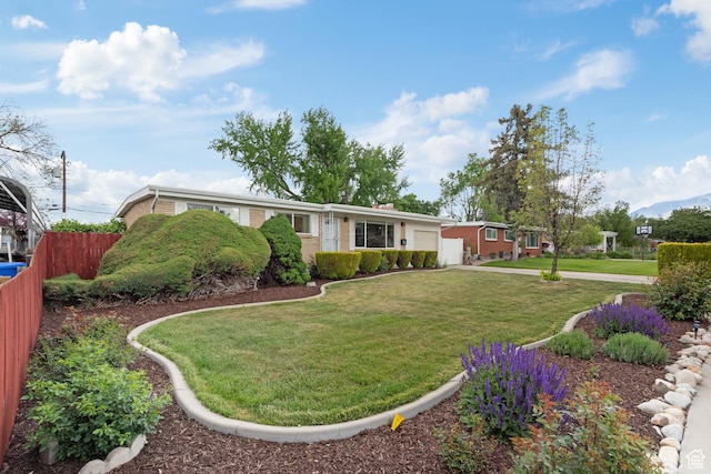 single story home featuring an attached garage, brick siding, and driveway