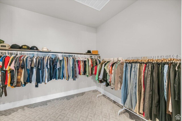 1003 N Grand Heights Dr, St George, UT 84770 - walk in closet with vaulted ceiling and carpet