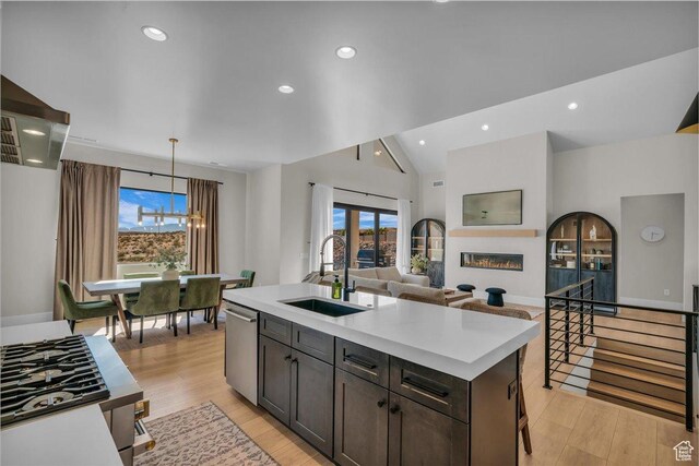1003 N Grand Heights Dr, St George, UT 84770 - kitchen with a sink, light countertops, plenty of natural light, open floor plan, and recessed lighting