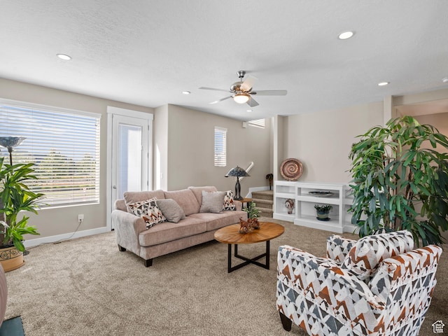 living area featuring carpet, recessed lighting, a ceiling fan, and baseboards