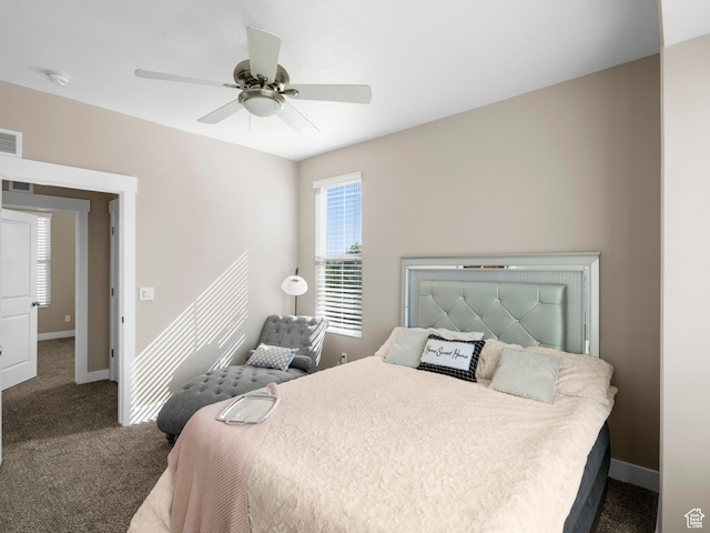 bedroom with carpet, baseboards, and ceiling fan