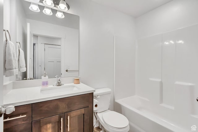 full bathroom featuring toilet and vanity