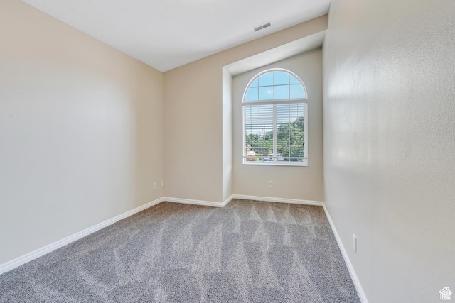 1140 E Elgin Ave S, Millcreek, UT 84106 - carpeted empty room featuring baseboards