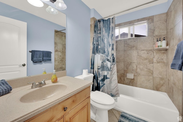 full bathroom featuring toilet, vanity, shower / tub combo, and tile patterned floors