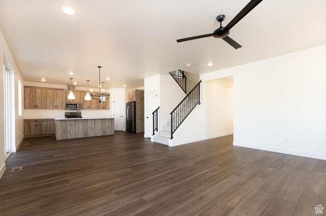 1262 N 3625 W Cir W, Cedar City, UT 84721 - unfurnished living room featuring a ceiling fan, dark wood-style flooring, stairway, baseboards, and recessed lighting