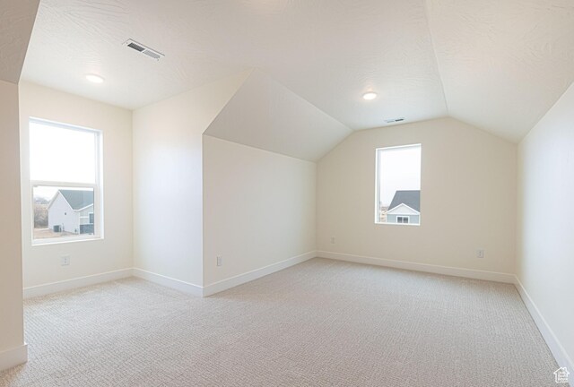 1262 N 3625 W Cir W, Cedar City, UT 84721 - additional living space featuring light colored carpet, vaulted ceiling, and baseboards