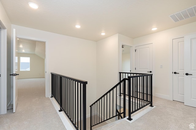 1262 N 3625 W Cir W, Cedar City, UT 84721 - hallway with an upstairs landing, light colored carpet, recessed lighting, and baseboards