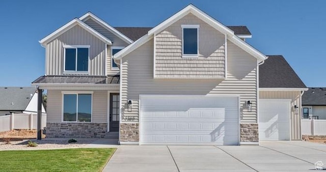 1262 N 3625 W Cir W, Cedar City, UT 84721 - craftsman-style house with stone siding, driveway, and an attached garage