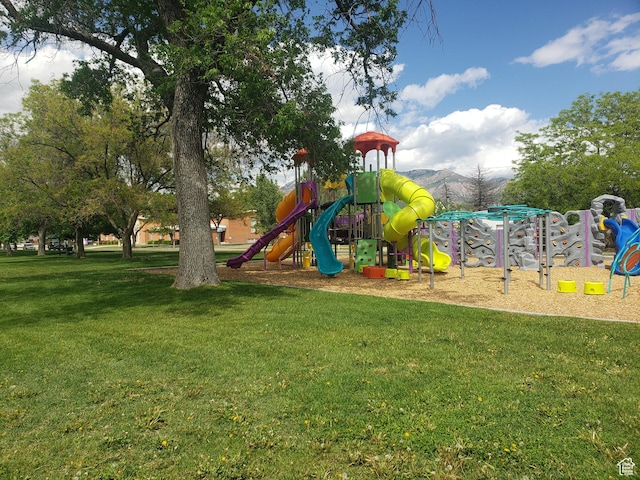 community play area with a yard
