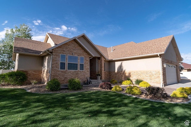 ranch-style home featuring stone siding, stucco siding, an attached garage, and a front lawn