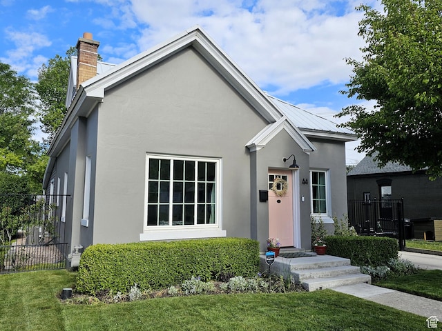 44 S 700 E, Provo, UT 84606 - view of front of property featuring stucco siding and a chimney