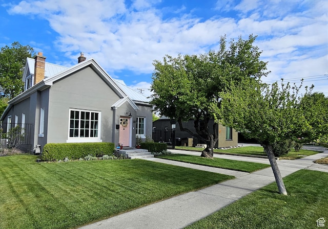 44 S 700 E, Provo, UT 84606 - view of front of house with stucco siding and a chimney