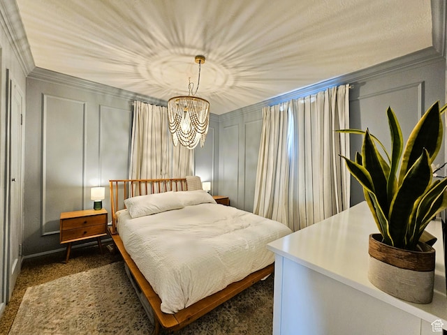 44 S 700 E, Provo, UT 84606 - bedroom featuring a decorative wall, dark carpet, crown molding, and a chandelier