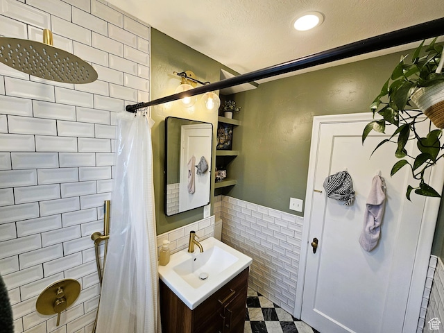 44 S 700 E, Provo, UT 84606 - full bath with tile walls, curtained shower, vanity, a wainscoted wall, and recessed lighting