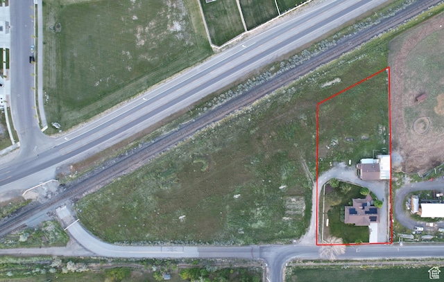 aerial view of property and surrounding area with property boundaries highlighted