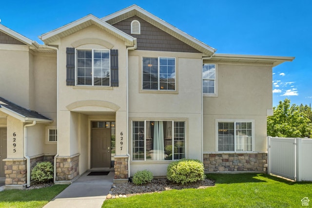 6297 W Traveler Ln, West Jordan, UT 84081 - view of property with stone siding and stucco siding