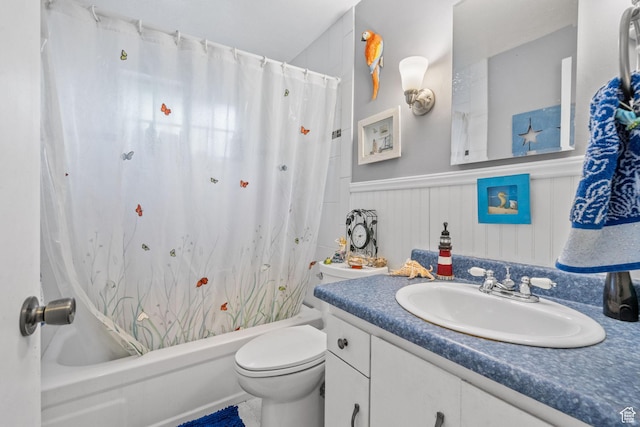 7472 S Silver Cir, West Jordan, UT 84084 - full bathroom featuring shower / tub combo with curtain, vanity, toilet, and a wainscoted wall