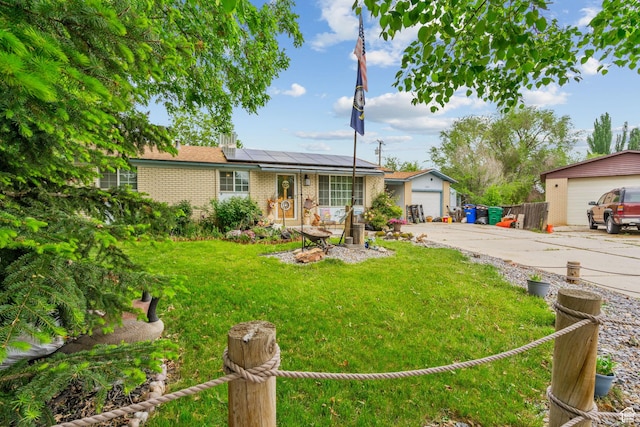 7472 S Silver Cir, West Jordan, UT 84084 - single story home with brick siding, roof mounted solar panels, and a garage