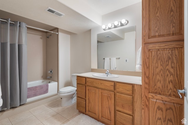 full bath featuring tile patterned flooring, toilet, shower / bath combo with shower curtain, and vanity