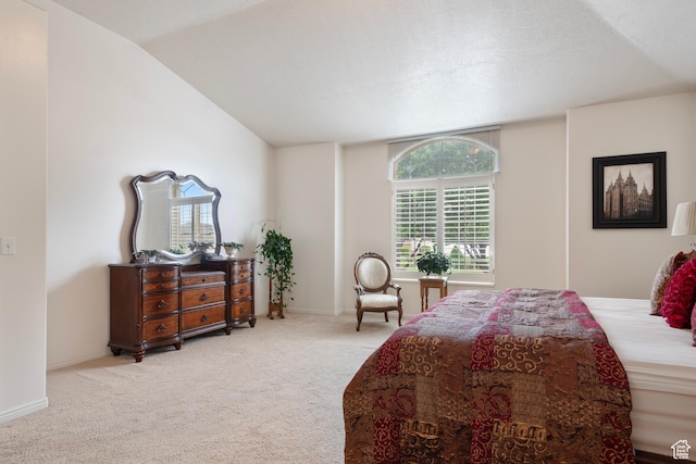 carpeted bedroom with baseboards