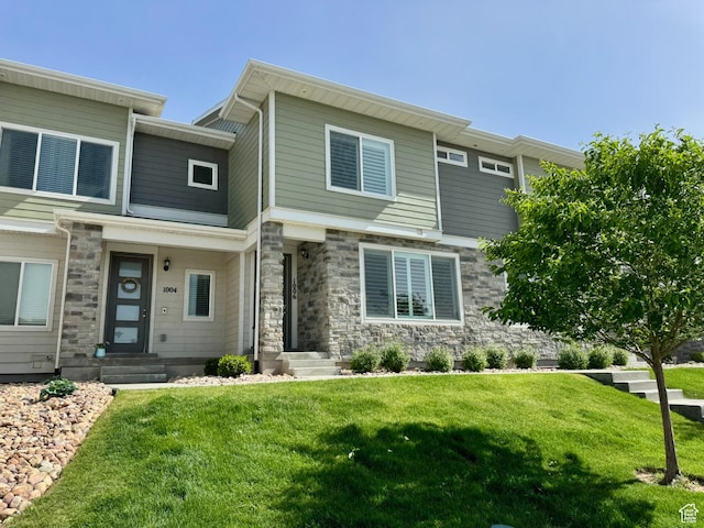 1006 W Sapphire Peak Dr, Bluffdale, UT 84065 - view of front of home featuring a front lawn and stone siding