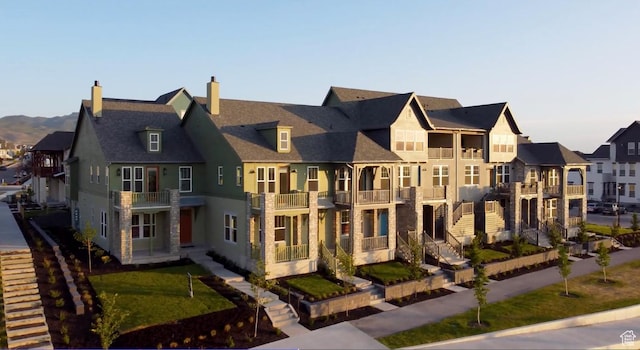 11437 S Watercourse Rd Unit 183, South Jordan, UT 84009 - view of front facade with a residential view and a chimney