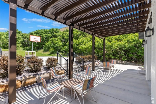 view of patio / terrace featuring a pergola