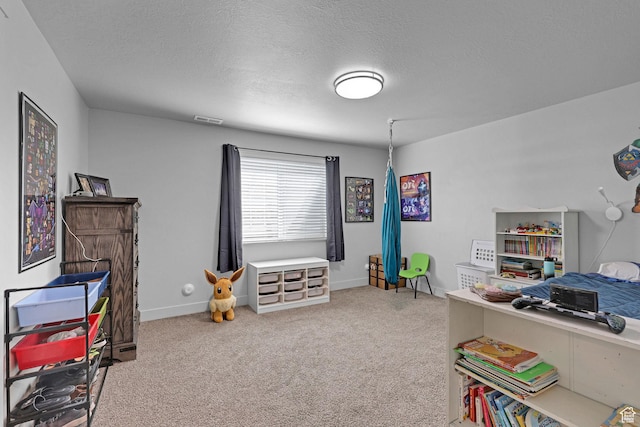 200 W 1200 S Unit 18, Tremonton, UT 84337 - bedroom featuring carpet flooring, a textured ceiling, and baseboards