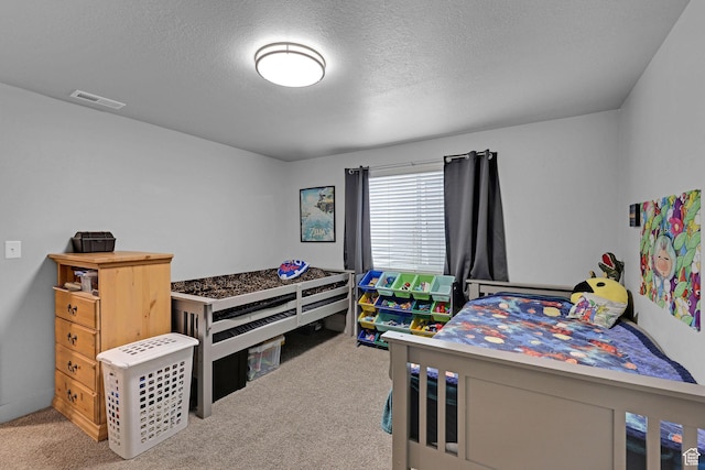 200 W 1200 S Unit 18, Tremonton, UT 84337 - bedroom featuring carpet floors and a textured ceiling