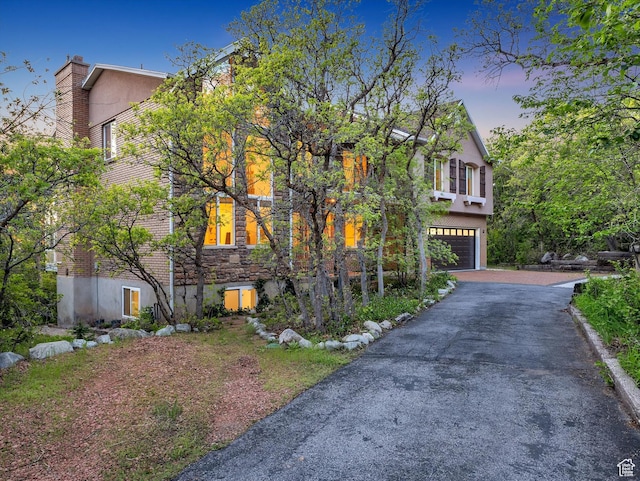 3351 E Deer Hollow Cir S, Sandy, UT 84092 - view of front facade with an attached garage and driveway